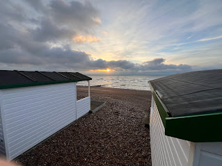Freshly painted beach hut on the East Sussex seafront